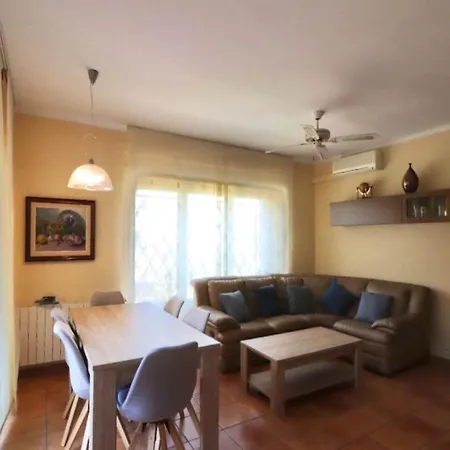 House In Roses With Waterfront Views